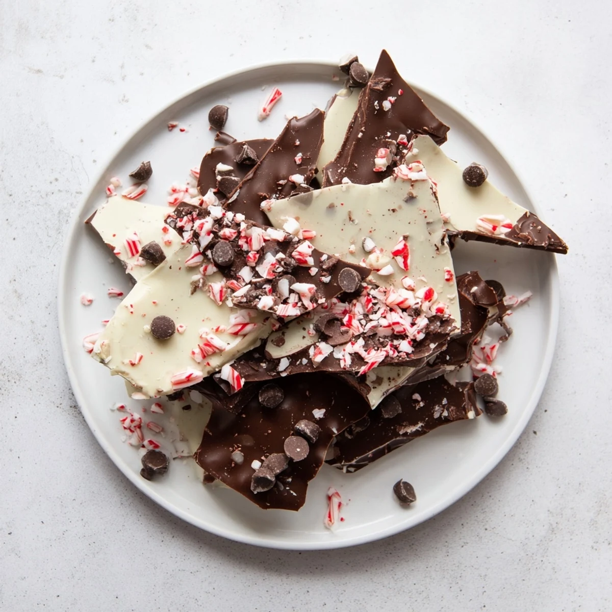 Beautiful shards of homemade Peppermint Bark, a festive and delightful holiday dessert.