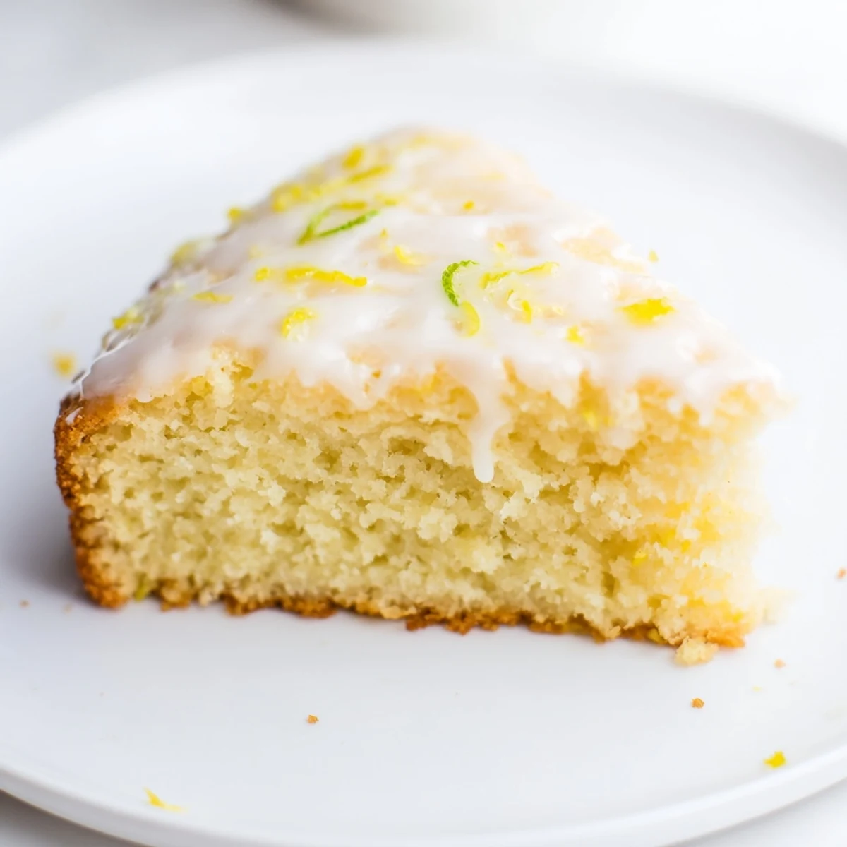 Freshly baked lemon yogurt cake, moist and fragrant, ready to be enjoyed with a cup of tea.