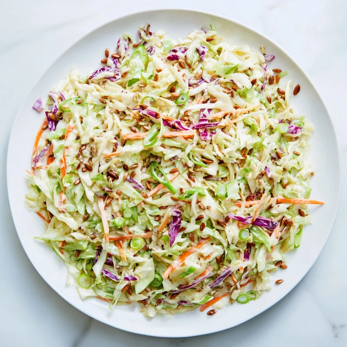 Look at the inviting texture of this crunchy coleslaw salad, ready to be enjoyed as a refreshing side dish.