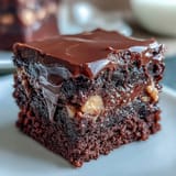 Rich, fudgy brownies stuffed with gooey peanut butter cups for a decadent dessert everyone will love.