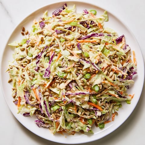 Fresh, colorful crunchy coleslaw salad, with bright shredded cabbage and creamy dressing, perfect for summer.
