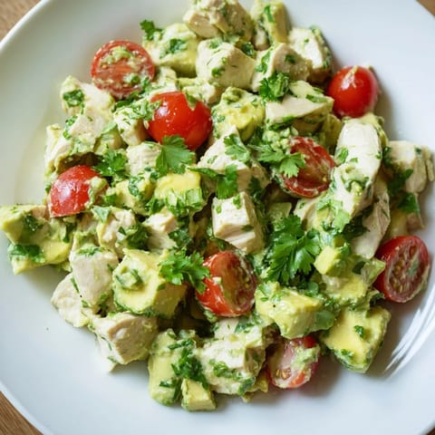 Healthy avocado chicken salad served in crisp lettuce cups, perfect for a low-carb gluten-free lunch.  