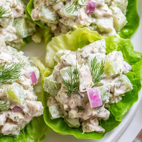 Fresh Dill Pickle Chicken Salad Lettuce Cups prepared with shredded chicken, tangy pickles, and herbs in buttery lettuce, perfect for a light lunch.