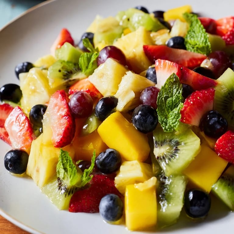 Sweet and tangy Tropical Pineapple Fruit Boat is a refreshing fruit salad for a summer treat.