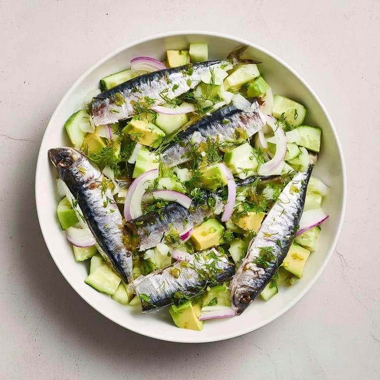 Refreshing cucumber and tinned fish salad: creamy avocado and tangy dressing make it a perfect date night meal.