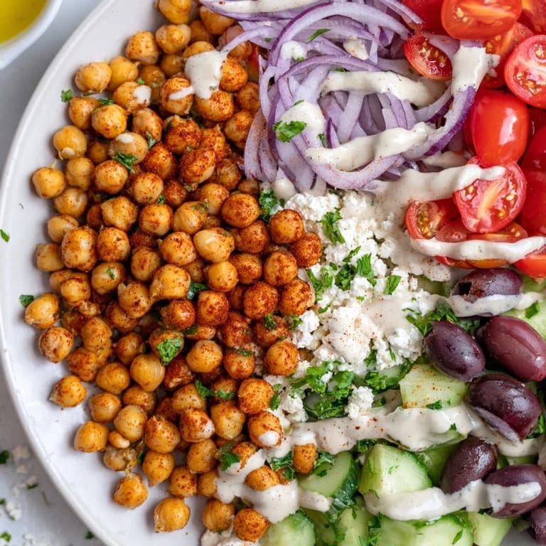 A satisfying Mediterranean Chickpea Bowl piled high with roasted chickpeas, perfect for a vegan lunch.