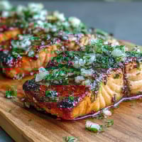 Cedar Plank Salmon with Lemon Dill, smoky and aromatic, grilled to perfection with fresh herbs and citrus slices.